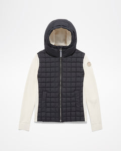 Aspen Collection Aether Phase Hooded Sweater. Black puffer core and hood, white knit sleeves