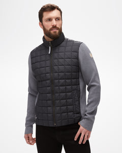 Aspen Collection Aether Phase Men's Full Zip Jacket, grey knit fabric on arms, white patch on shoulder, black puffer fabric on core of jacket