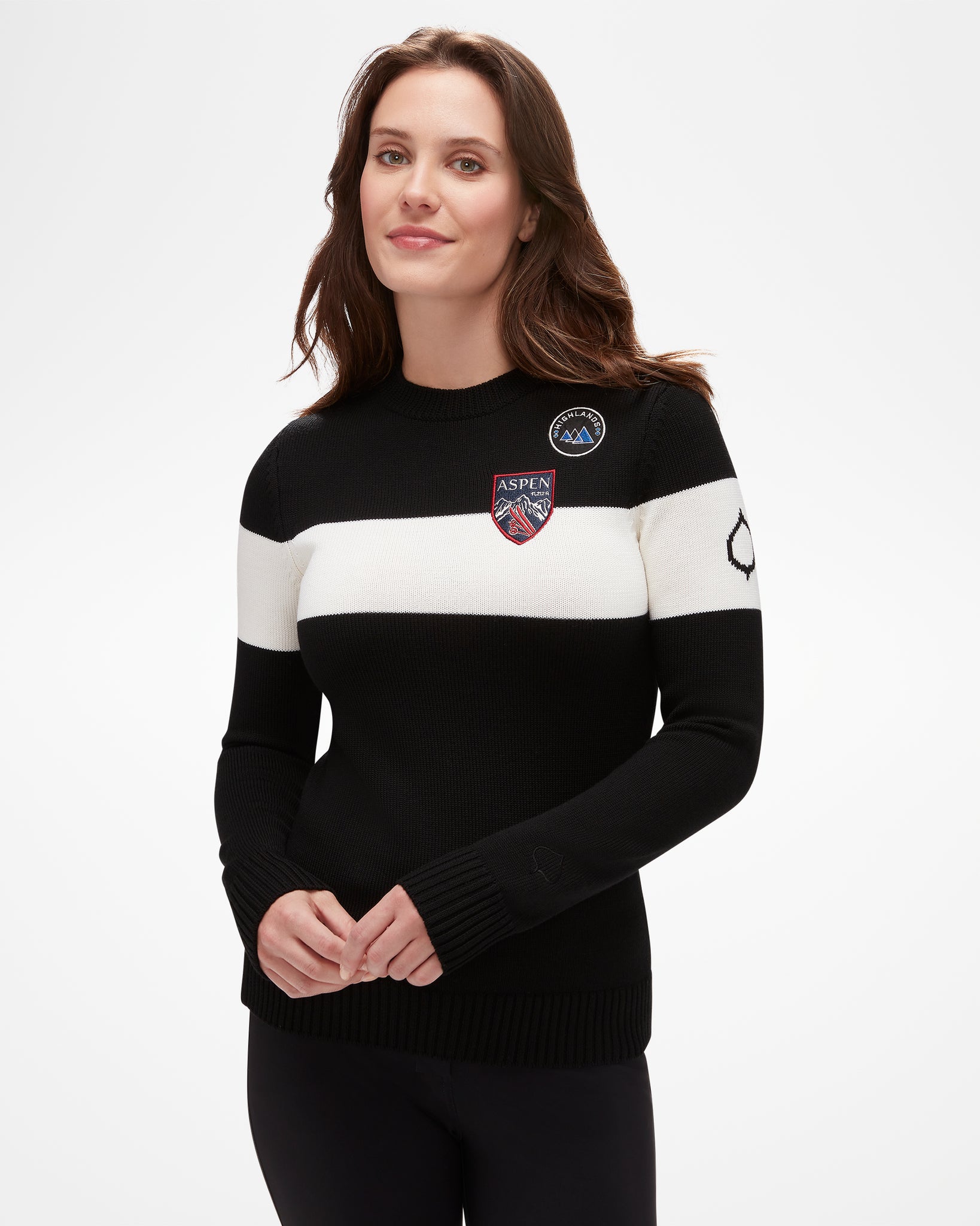 Heritage Women's Sweater, by Aspen Collection. Black knit with white stripe across chest, with Aspen Highlands patches on shoulder and chest.