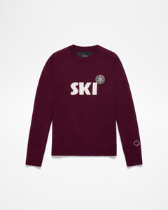 Ski Women's Sweater, without model, in maroon color. "Ski" lettering in white with snow flake above