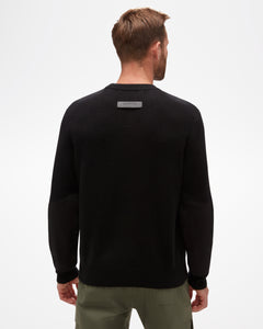 Rayburn Men's Cashmere Sweater back view, in black with small grey logo at nape of neck