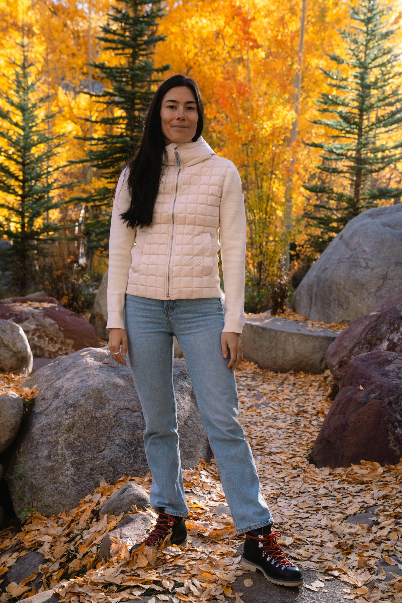 Aspen Collection Aether Phase Hooded Sweater, lifestyle shoot, of white jacket, full body view.