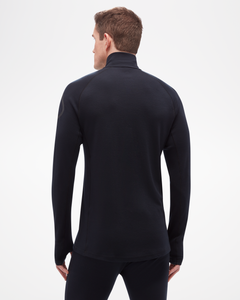 Aspen Collection men's mid layer top, made from merino wool. Black, quarter zip, form fitting with discrete black leaf logo on left arm- view of model from back