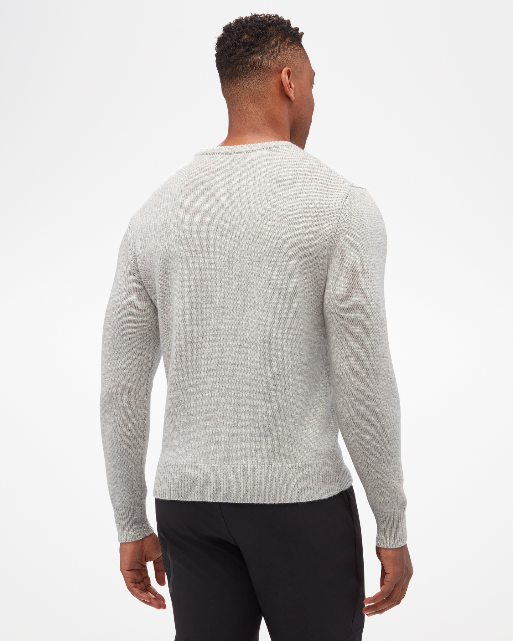 Aspen Collection men's Cashmere Crewneck, simple fitted knit, in grey color. Back view of model.