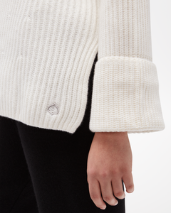 Women's Aspen Collection Cashmere Funnel Neck Sweater, loose white knit, focused on small logo and cuffed sleeve