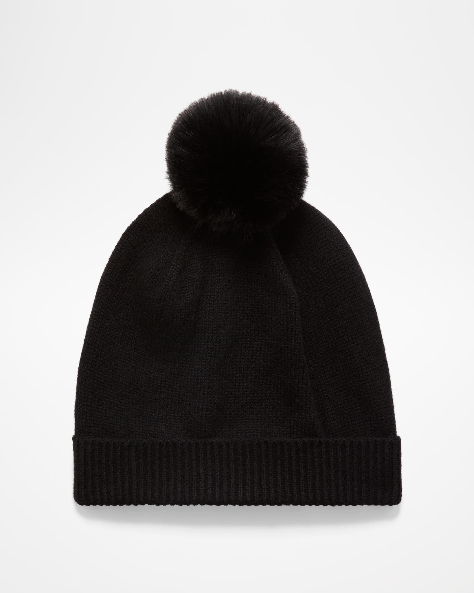 Cashmere POM Beanie by aspen collection, all black with black pom on top, back view